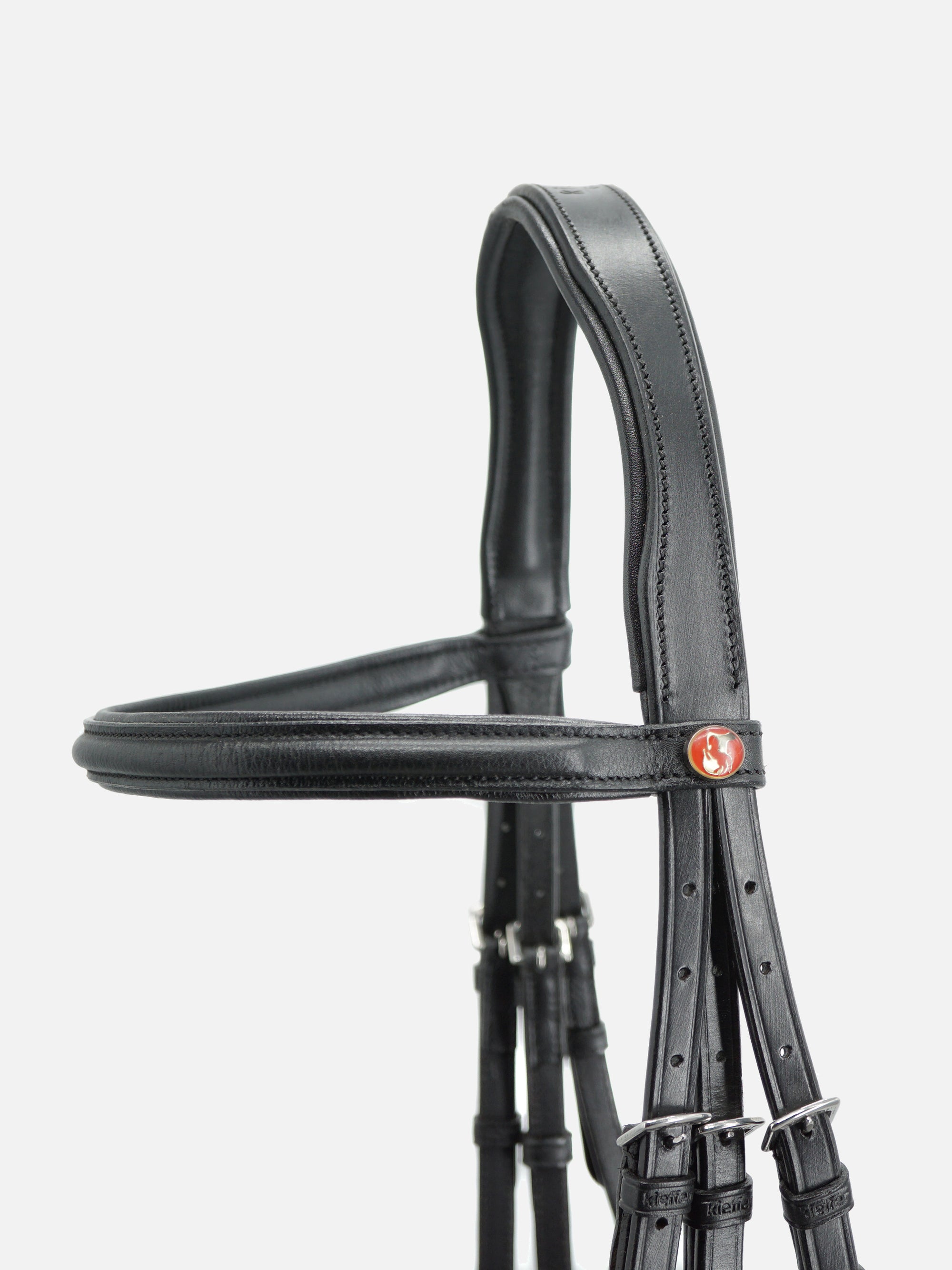 Trense Kieffer Ultrasoft® Economy in Schwarz mit Chrombeschlägen: Genickstück und bombiertes Stirnband