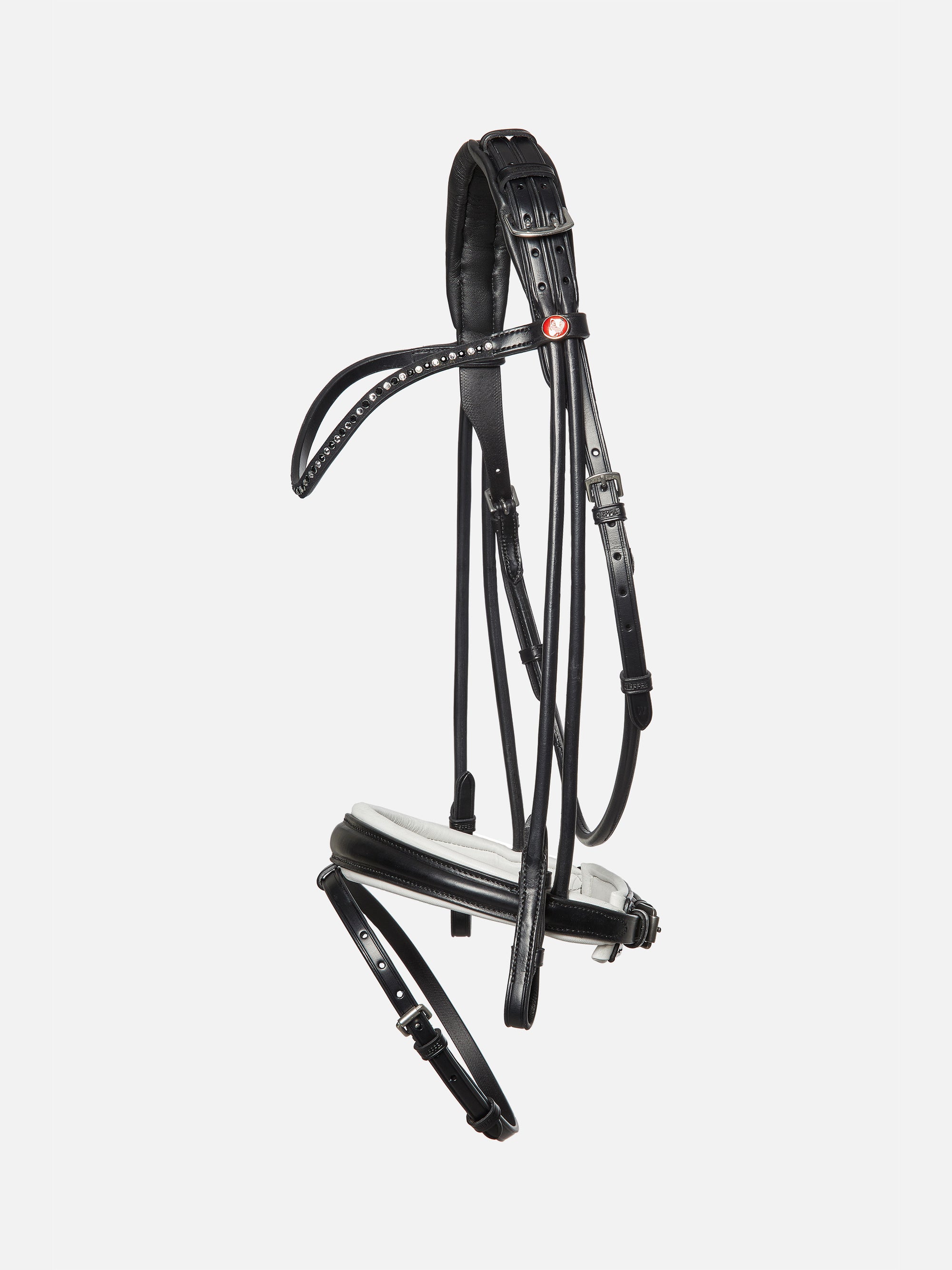 Rundgenähte Trense Sylvie II in Schwarz mit weißer Unterlegung, Chrombeschlägen und schwarz-weißem Kristall-Stirnband